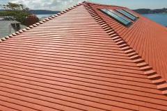 Installation of Koramic clay roof tiles on this residential property in Sydney’s Point Piper